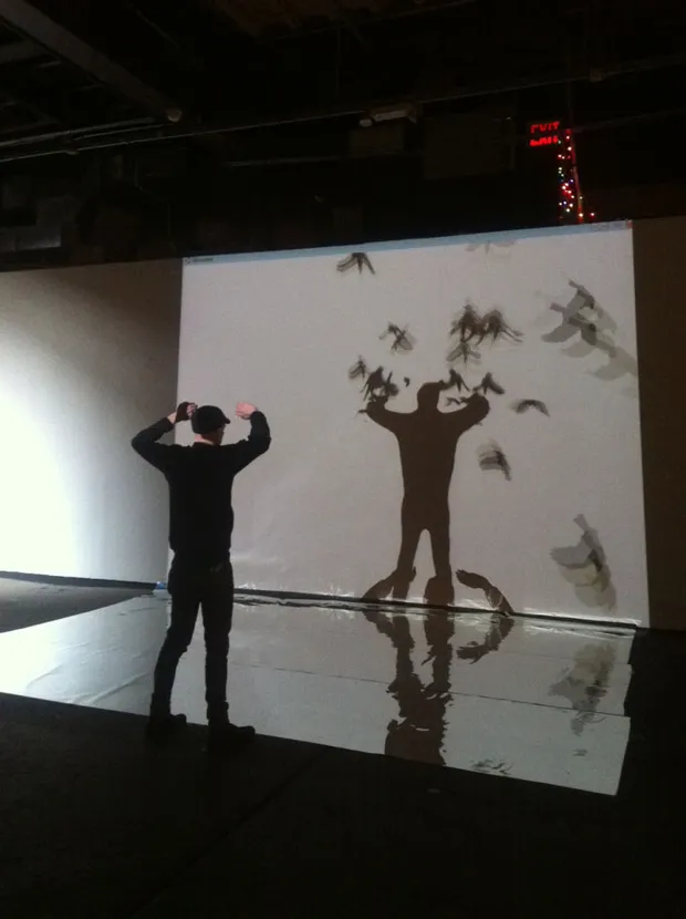 A view of an early demo showing birds flocking to a persons shadow.